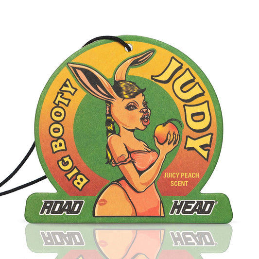 Vintage-style car air freshener with Judy and Big Booty text, holding a peach.