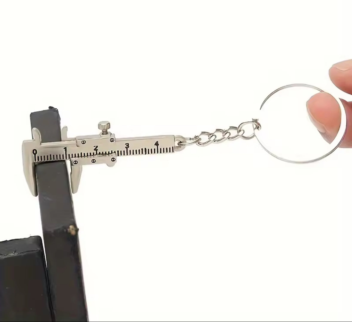 Mini caliper keychain with chain and ring, measuring tool.