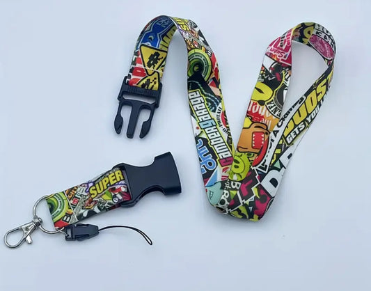 Colorful comic-themed lanyard with adjustable buckle and key ring.