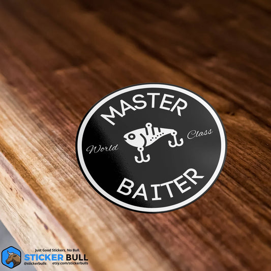 Round sticker with Master Baiter text and fishing lure design on wood surface.