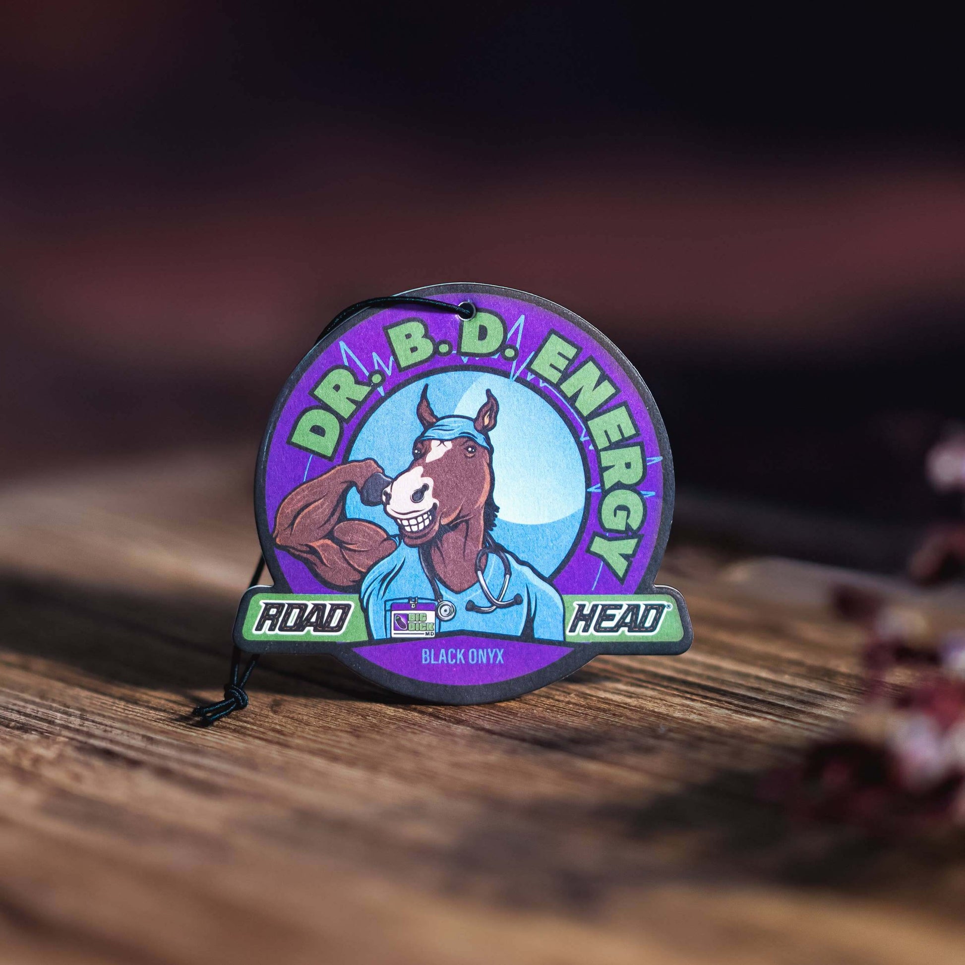 Purple circular sticker featuring a cartoon horse labeled Dr. B.D. Energy with Road Head text below.
