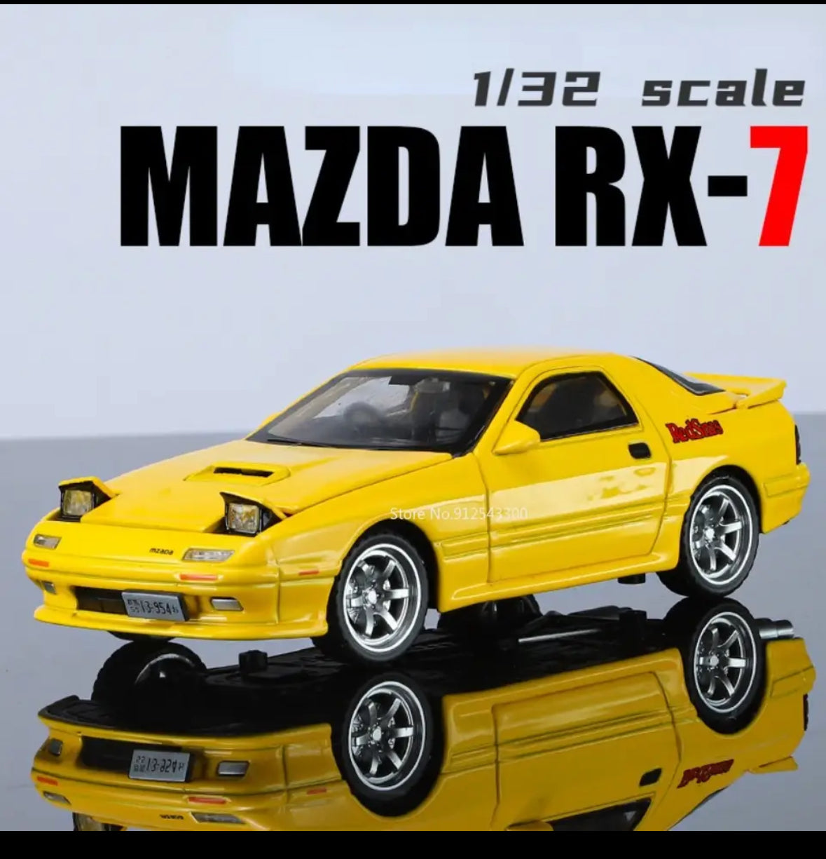 Yellow 132 scale Mazda RX-7 diecast model car with reflection.