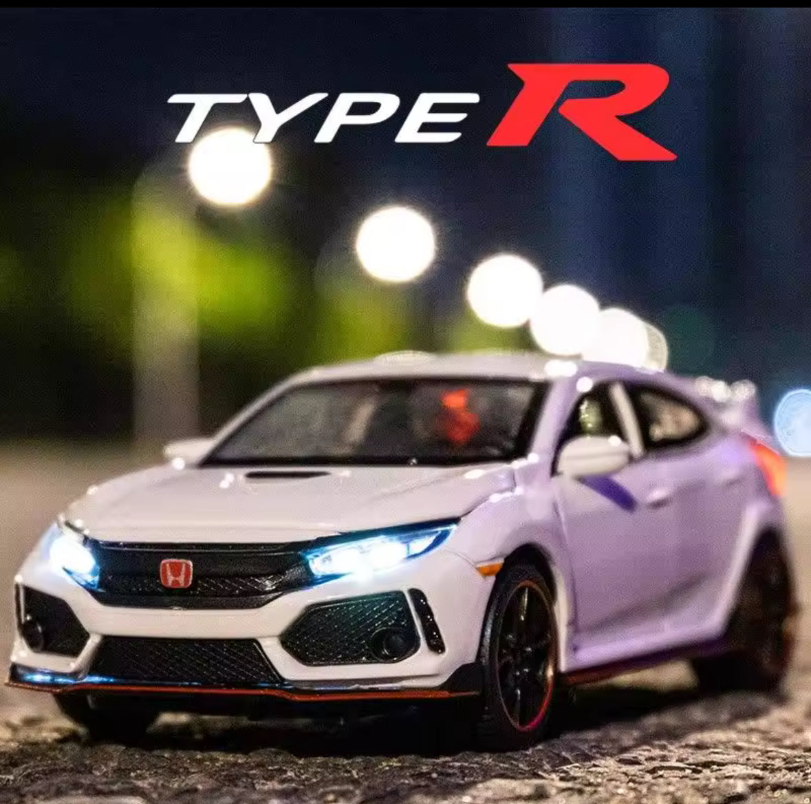 White Honda Civic Type R toy car at night with illuminated headlights.