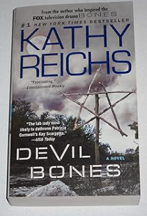 Kathy Reichs Devil Bones book cover featuring a Native American teepee.