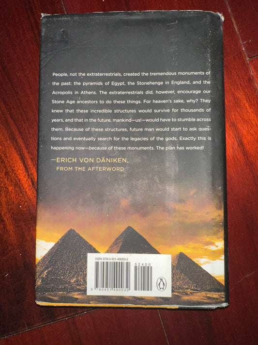 Book cover with pyramids at sunset, Erich von Dniken quote about extraterrestrials.