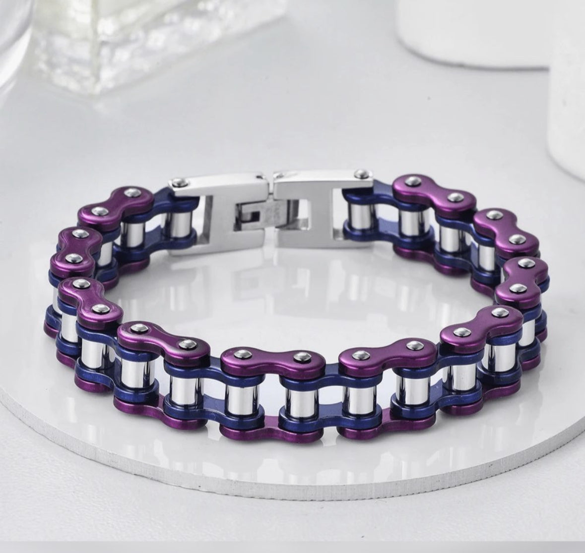 Purple and silver motorcycle chain bracelet with metallic clasp.