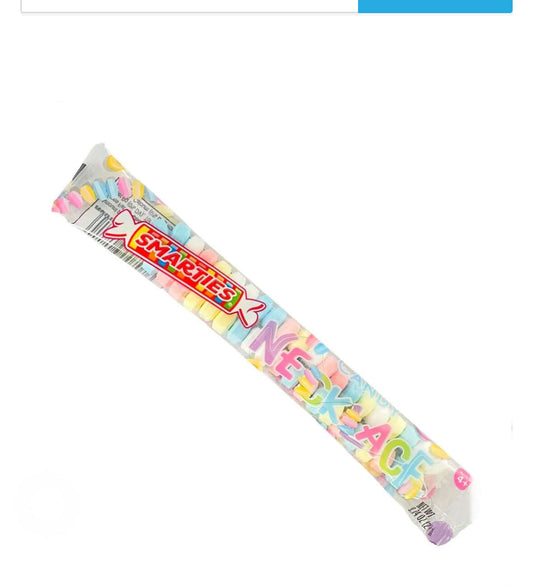 Smarties necklace candy in colorful packaging.